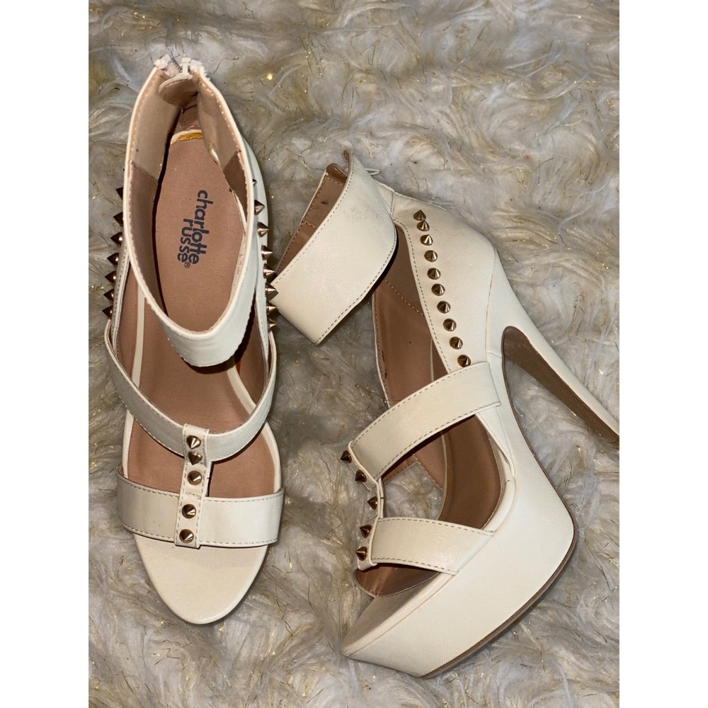 Cream heels with gold embellishments